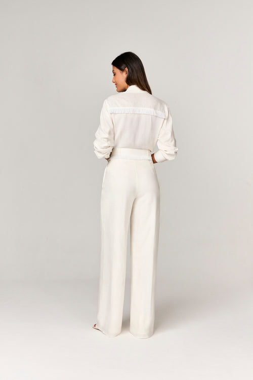 CALCA PANTALONA COM DETALHE FRANJAS E BOTAO MOEDA