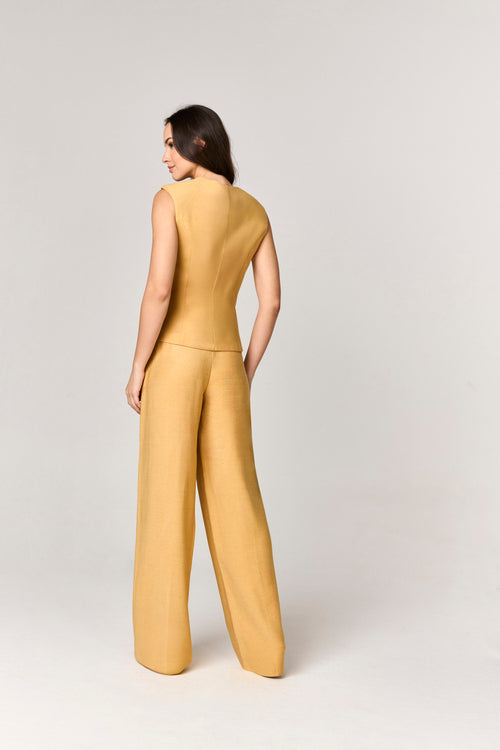 CONJUNTO CALCA E COLETE COM ASSIMETRIA