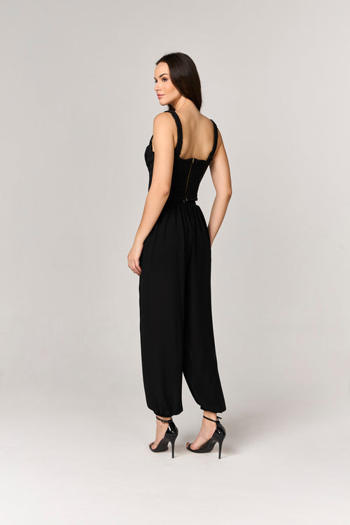 CONJUNTO CALCA E CROPPED COM DETALHES DE TRANCADO